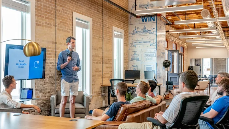 Creative team brainstorming digital strategy on a whiteboard